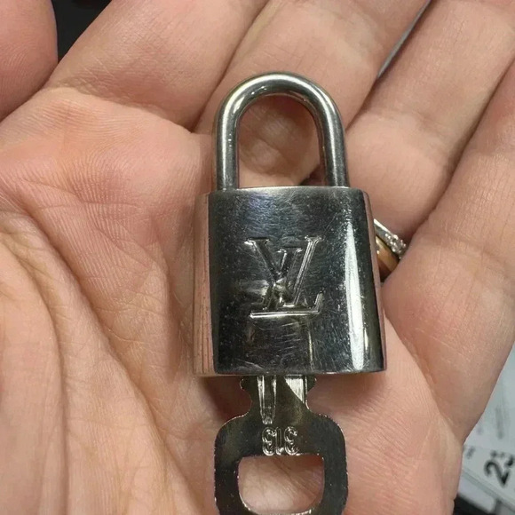 LV Silver Lock and Key in Dust Bag - Picture 4 of 5